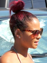 Lovely christina milian looking mischievous in her one-piecer without bra