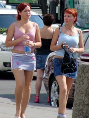 Upskirts views of a plenty of young maidens walking along city streets